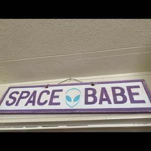 Customized “Space babe” weathered sign